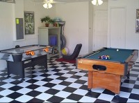 Stylish Games Room with pool table and Air Hockey at our villa in Orlando near Disney World Resort, Florida
